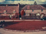 Cottages below the hill fort
